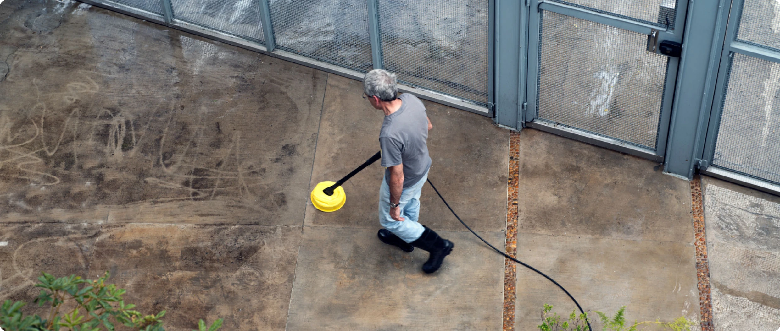 Cleaning with yellow pressure washer